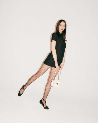 Tish Weinstock wears Valentino Urban Riviera and Valentino Garavani Rockstud Ballerina shoes. - © System Magazine