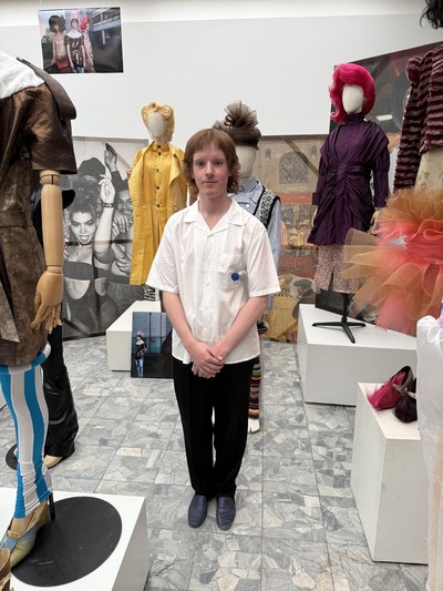 Student Conor Turley in front of his graduation collection. - © System Magazine
