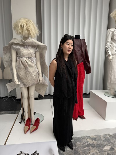 Student Yichun Liu in front of her graduation collection. - © System Magazine