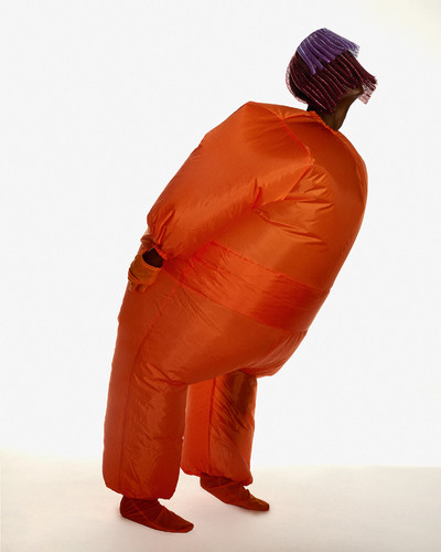 Thomas de Kluyver. - © Christie wears stylist&rsquo;s own headpiece, blow-up suits, gloves and socks. Make-up: Gucci Beauty Brume de Beaut&eacute; and Baume Nourrissant Universel., System Magazine