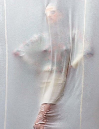 Knit by Prada 
Skirt by Faustine Steinmetz 
Shoes by Balenciaga 
Earrings by Vanessa Schindler - © System Magazine