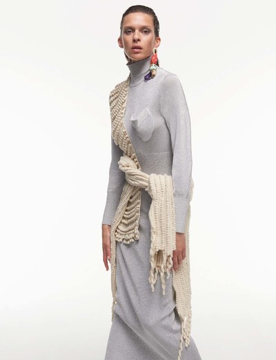 Dress by J.W.Anderson 
Scarf and cardigan by Loewe 
Single earring by Matty Bovan - © System Magazine