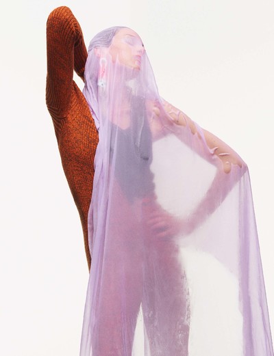 Jumpsuit by Gucci 
Top by Berluti 
Single earring by Matty Bovan - © System Magazine
