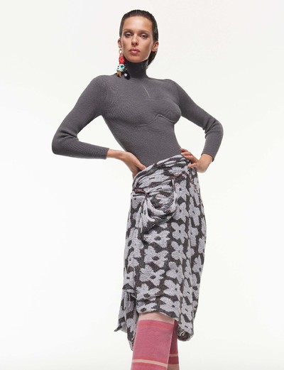 Top by Balenciaga 
Skirt and earring by Matty Bovan 
Trousers by Miu Miu 
Boots by Toga - © System Magazine