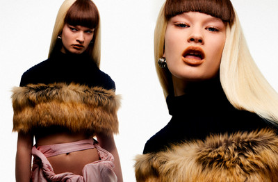 Britt wears turtleneck by Maison Margiela, skirt by Y/Project, earrings by Mugler, and faux-fur stole by Haley Wollens Studio. - © System Magazine