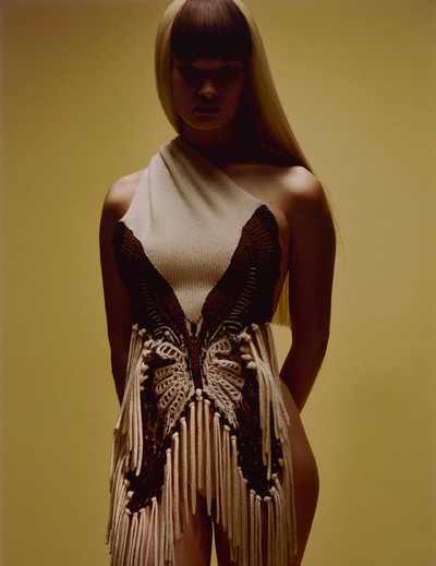 Britt wears scarf (worn as dress) by Chloé. - © System Magazine