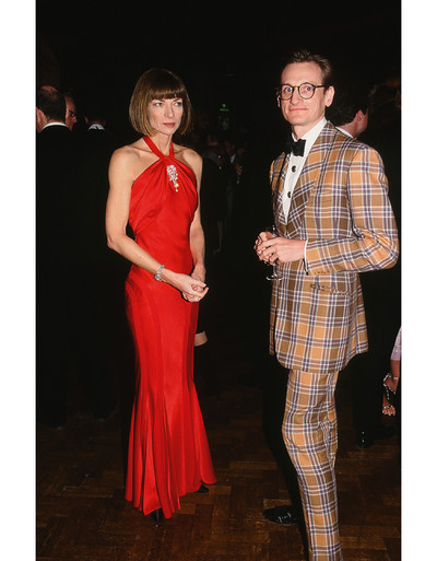 An immoderate aesthete. Hamish Bowles. - © Bowles with Anna Wintour at Christie&rsquo;s in London, 1999. &lsquo;Anna is wearing Dior haute couture by John Galliano from his *Surrealist* collection. I am wearing a three-piece suit that I had acquired the year before at a Sotheby&rsquo;s sale of the estate of fabled Scottish dandy, the Hon. Neil &ldquo;Bunny&rdquo; Roger. Like all his suits, it was made by Watson, Fagerstrom &amp; Hughes, and features antique pressed-metal buttons depicting rabbits.&rsquo;, System Magazine