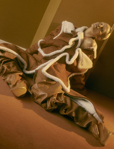 Natasha wears brown suede coat and leather thigh boots by Y/Project Autumn/Winter 2022 - © System Magazine