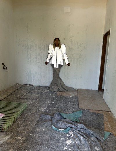 Tyrone wears Kunst bomber jacket and AL gown, from *Strobe*, Autumn/Winter 2022 - © System Magazine