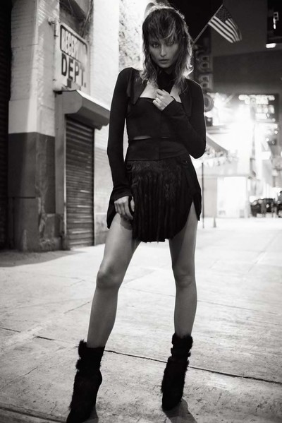 Vintage early-2000s jersey cardigan, miniskirt (customised with goat-hair fringe), shearling-trimmed wedges and bandana bra top all by Helmut Lang - © System Magazine