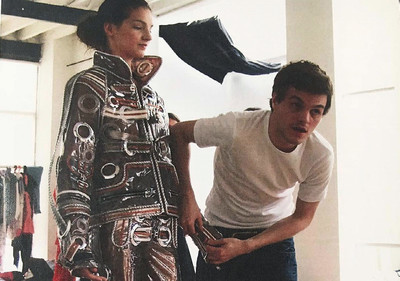 Matthieu Blazy fitting one of his student collections at La Cambre. - © System Magazine