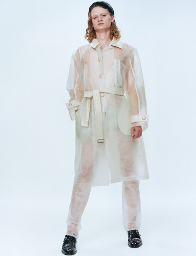 Momentum. Martine Rose & Tamara Rothstein. - © Thibault wears clear PVC trench and clear PVC trousers, both Spring/Summer 2019, and black buckle loafers, Spring/Summer 2020., System Magazine
