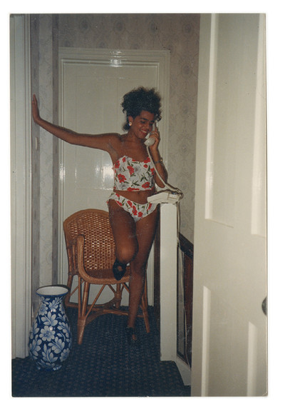1985. ‘At mum and dad’s house in Croydon, Michelle in her underwear, on the landline, on the landing. I took this photo. I was only six at the time.’ - © System Magazine