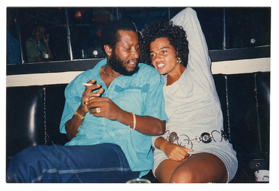 1990. ‘Throughout the mid-1980s and early 1990s, Michelle went to Jamaica pretty often; a couple of those times was when they toured the *Black Heroes* theatre show there.
In this photo, she’s in a recording studio in Kingston with a local musician.’ - © System Magazine