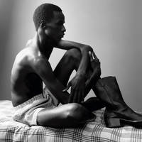 Malick Bodian - © Cotton boxers by Sunspel and leather boots by Prada., System Magazine