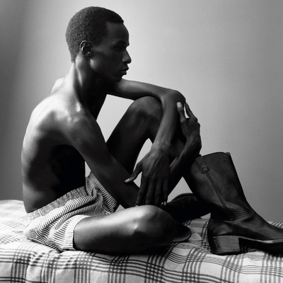 Malick Bodian - © Cotton boxers by Sunspel and leather boots by Prada., System Magazine
