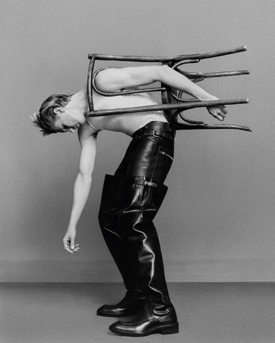 Adrien Dantou - © Wool tank top by Miu Miu, leather trousers by Tom Ford and leather over-the-knee boots by Saint Laurent by Anthony Vaccarello., System Magazine