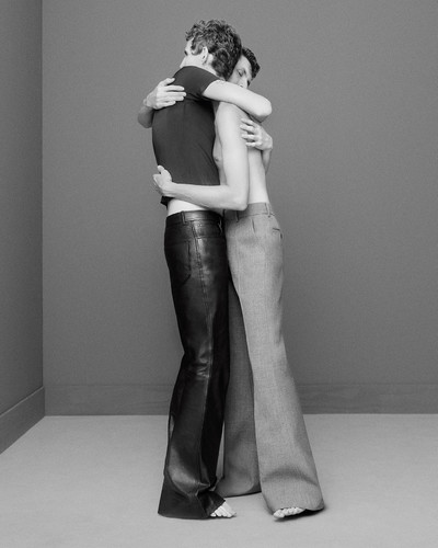 Henry Kitcher and Tom Atton Moore - © Cashmere sweater by Miu Miu and leather trousers by Louis Vuitton. Wool trousers by Rokh., System Magazine