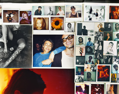 The Sorrentis. - © Davide and Mario (centre), surrounded by family and friends. 
From Mario&rsquo;s 2013 book *Draw Blood for Proof*., System Magazine