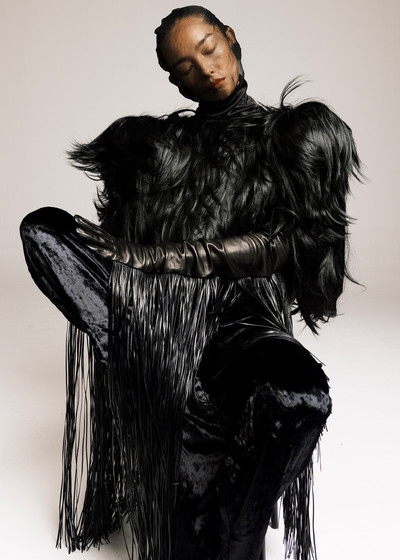 Zhong Lin. - © Coat by Junya Watanabe, top and trousers by Qiuhao, and gloves by Sportmax., System Magazine