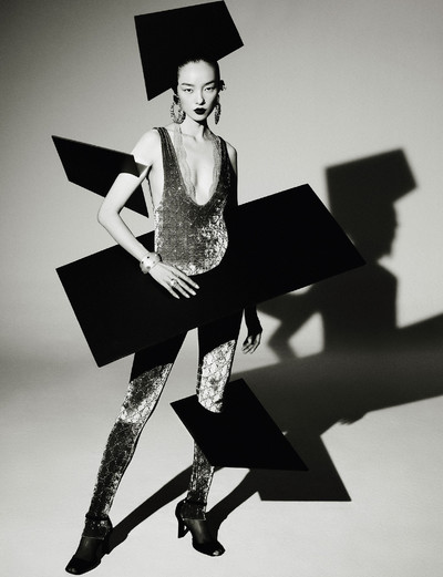 Zhong Lin. - © Vest and jumpsuit by Gucci, shoes by Courr&egrave;ges, bracelet and ring by Louis Vuitton, and earrings by Givenchy by Sarah Burton., System Magazine