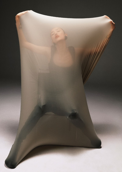 Zhong Lin. - © Dress by Marine Serre and bracelets by Givenchy by Sarah Burton., System Magazine