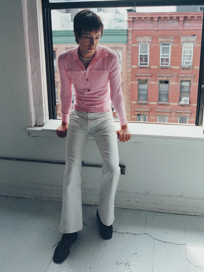 Menswear. Samuel Hine. - © Knitted polo shirt, T-shirt and shoes by Bottega Veneta, and trousers by Transat., System Magazine