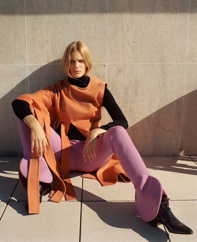 Black wool-jersey polo neck
Salmon wool-jersey tunic with fringes, 1971
Lilac wool-jersey wheel trousers, 1969
Black-patent leather Peter Pan boots - © System Magazine