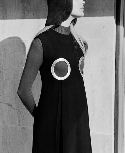 Brown crêpe-de-laine ‘Renée’ dress with silver leather disks, 1969
Black felt ‘helmet hat’, 1968 
Brown lycra slip - © System Magazine