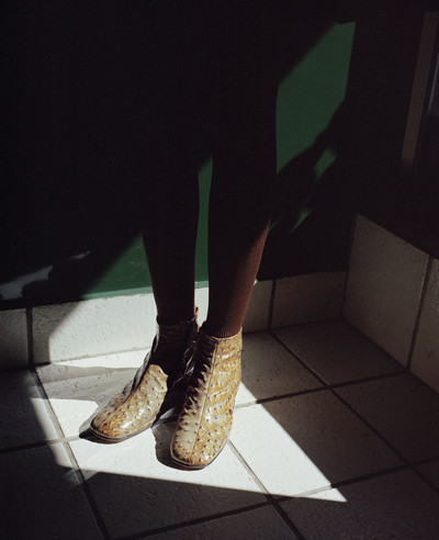 Olive faux ostrich-leather boots, 1989 - © System Magazine