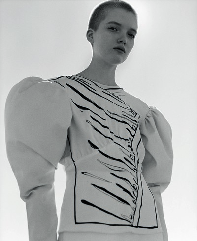 Leather and silk cream trompe-l’oeil leg-of-mutton sleeve top by J.W.Anderson - © System Magazine